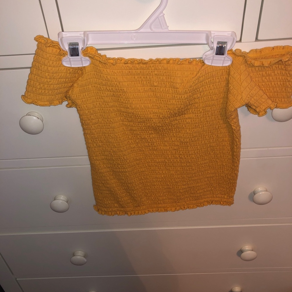 Yellow cropped shirt